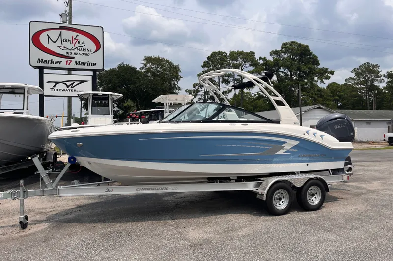 Slide: The Image of 2027 Chaparral 21 SSi OB boat on trailer at Marker 17 Marine dealership. - 2