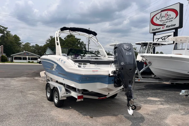 Slide: The Image of 2027 Chaparral 21 SSi OB boat with Yamaha 150 engine at Marker 17 Marine dealership. - 3