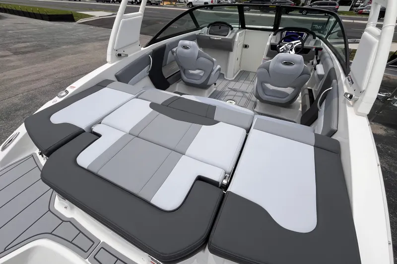 Slide: The Image of 2027 Chaparral 21 SSi OB boat interior with gray seating and modern design. - 6