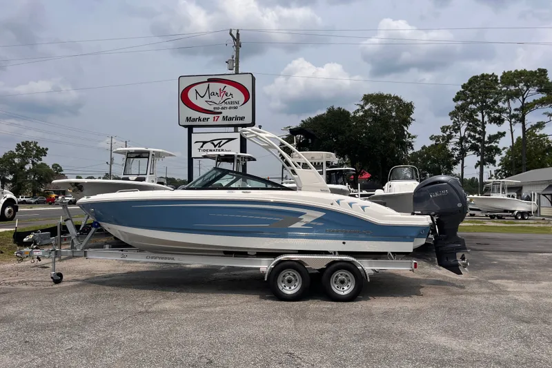 The Image of Chaparral 21 SSi OB 2027 boat on trailer at Marker 17 Marine dealership. - 1
