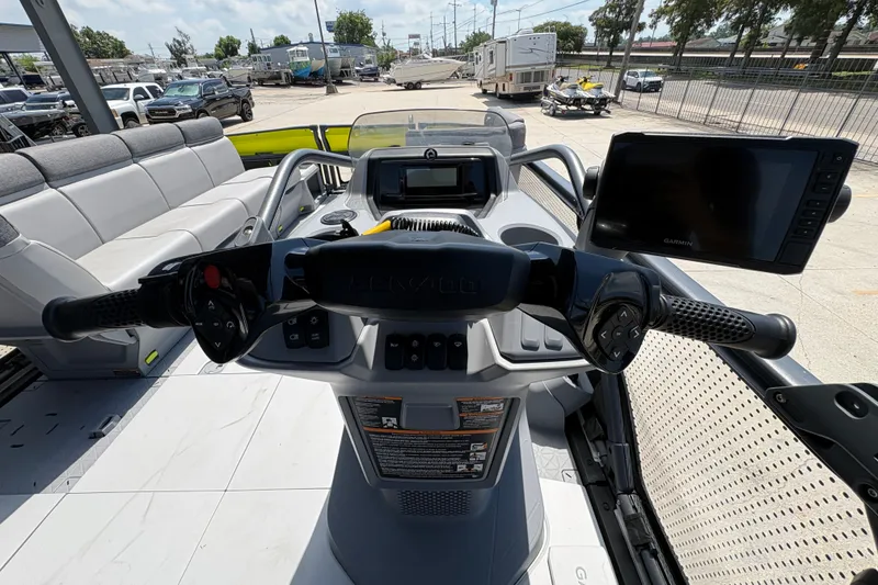 Slide: The Image of 2023 Seadoo Switch 21 dashboard with steering wheel and Garmin display. - 19