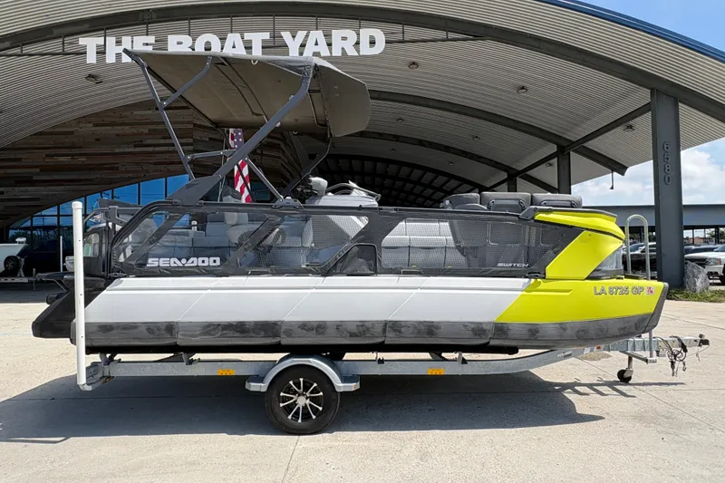 Slide: The Image of 2023 Seadoo Switch 21 pontoon boat on trailer at The Boat Yard dealership. - 3
