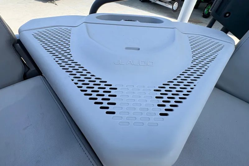 Slide: The Image of 2023 Seadoo Switch 21 JL Audio speaker system on boat deck. - 20