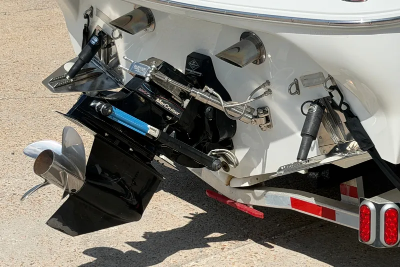 Slide: The Image of Rear view of a 2004 Baja 245 Performance boat with MerCruiser outdrive. - 7
