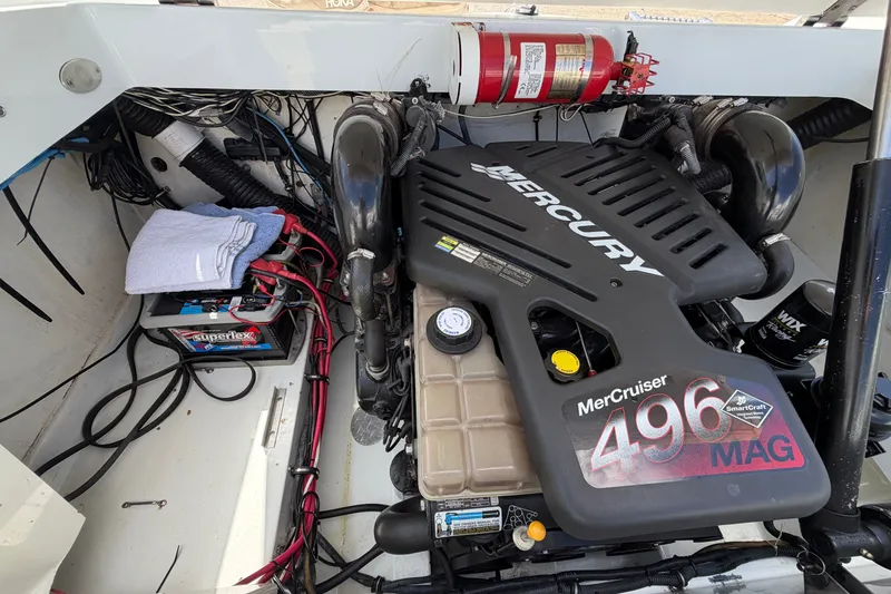 Slide: The Image of Engine compartment of a 2004 Baja 245 Performance boat with MerCruiser 496 MAG engine. - 17