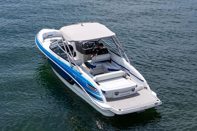 Slide: The Image of 2019 Formula 270 Bowrider boat on water, featuring sleek design and spacious seating. - 7