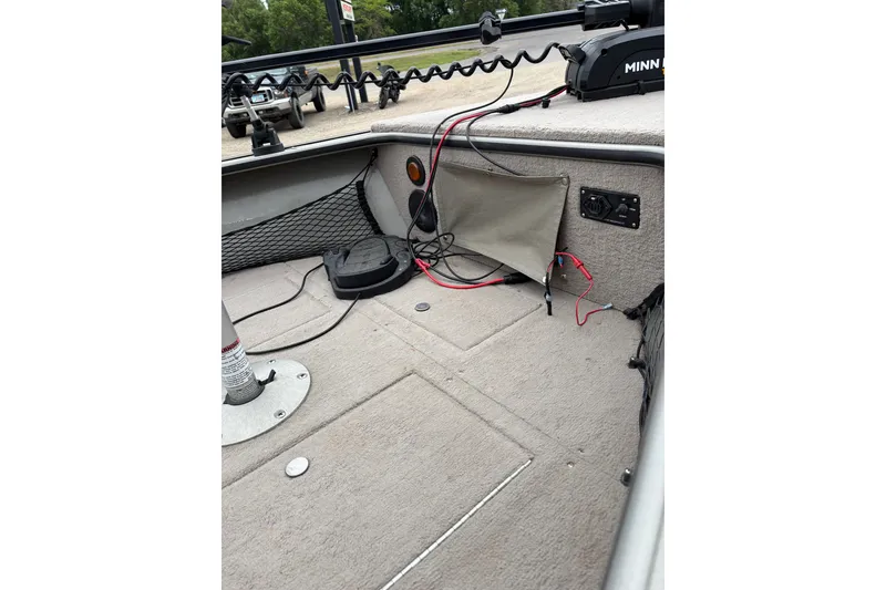 Slide: The Image of Interior of a 2001 Lund Mr. Pike 16 boat with wiring and equipment. - 12