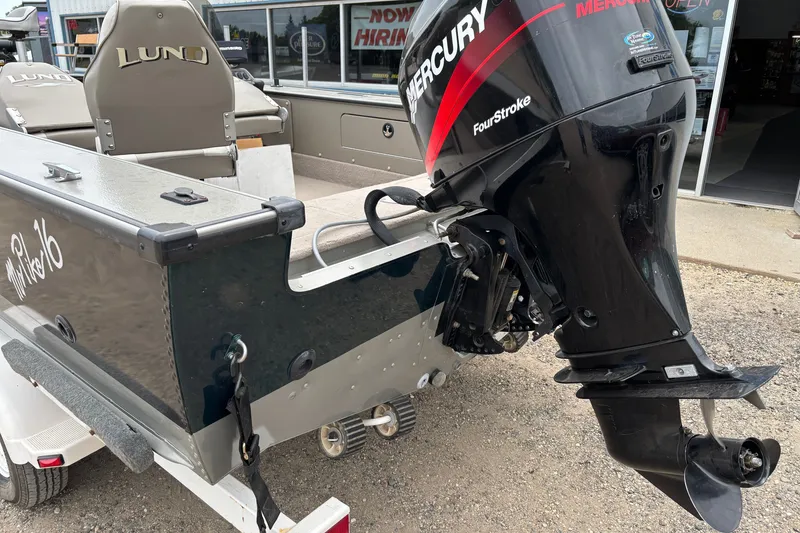 Slide: The Image of 2001 Lund Mr. Pike 16 boat with Mercury FourStroke outboard motor. - 4
