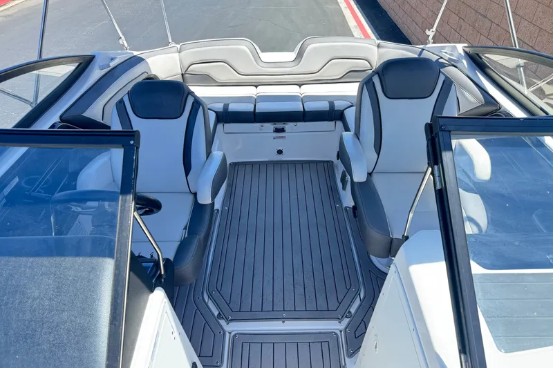 Slide: The Image of 2017 Yamaha Boats 212 Limited interior with sleek seating and modern design. - 17