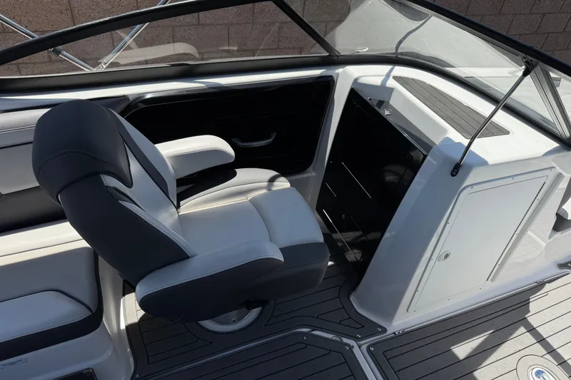 Slide: The Image of 2017 Yamaha Boats 212 Limited interior with sleek seating and modern dashboard design. - 22