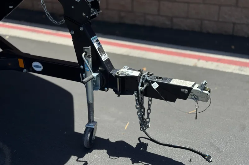 Slide: The Image of Trailer hitch of a 2017 Yamaha Boats 212 Limited on pavement. - 36