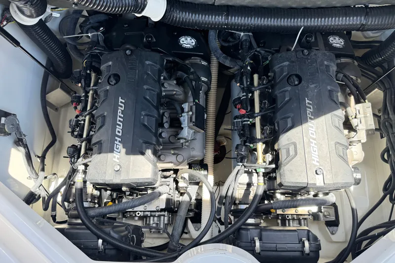 Slide: The Image of 2017 Yamaha Boats 212 Limited high output engines in the engine compartment. - 20