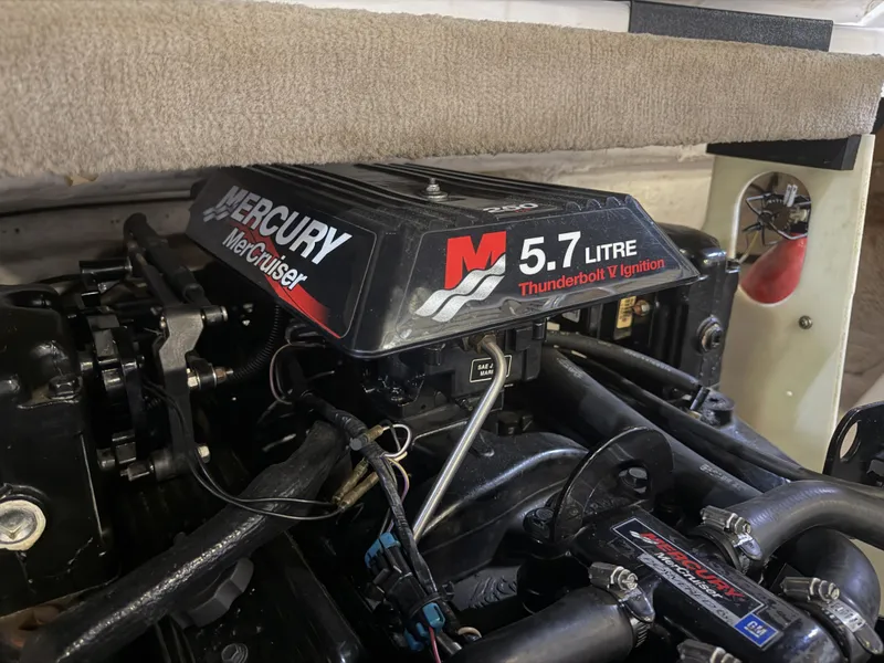 Slide: The Image of A Mercury MerCruiser 5.7-liter engine with Thunderbolt V ignition in a boat. - 47