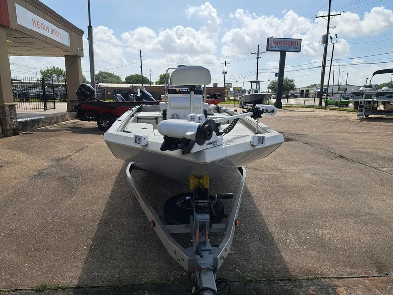 Slide: The Image of A 2022 Ranger RB190 boat sits on a trailer in a parking lot. It's an aluminum fishing boat. - 5