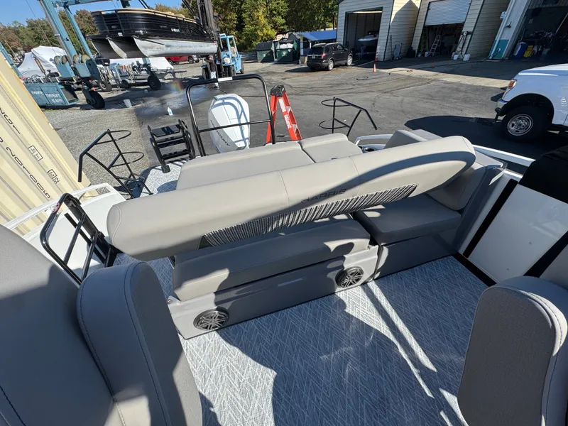 Slide: The Image of The image shows the interior of a 2027 Harris 230SOL with gray upholstery and modern design. - 16
