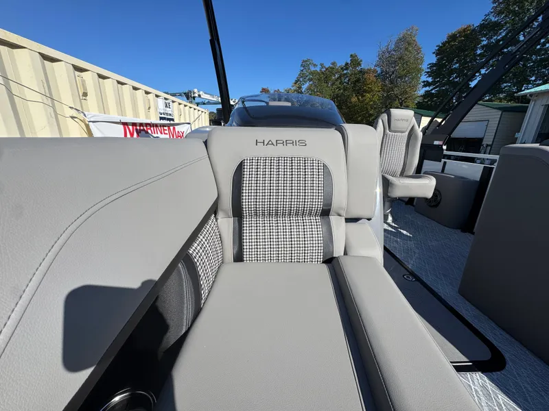 Slide: The Image of The image shows the sleek gray interior of a 2027 Harris 230SOL. - 24