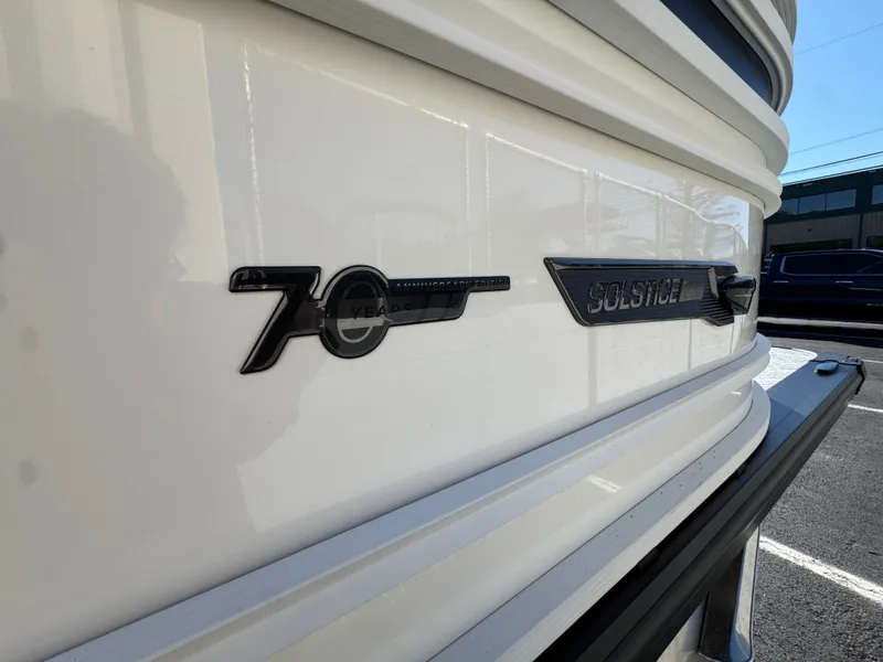 Slide: The Image of Close-up of the 2027 Harris 230SOL with Solstice emblem. - 8
