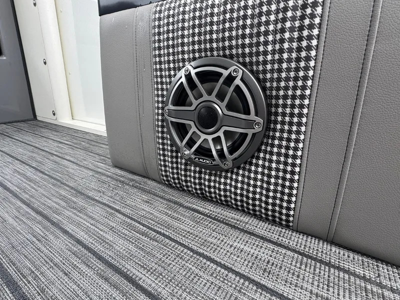 Slide: The Image of Close-up of a speaker in stylish, patterned upholstery on a boat. - 29