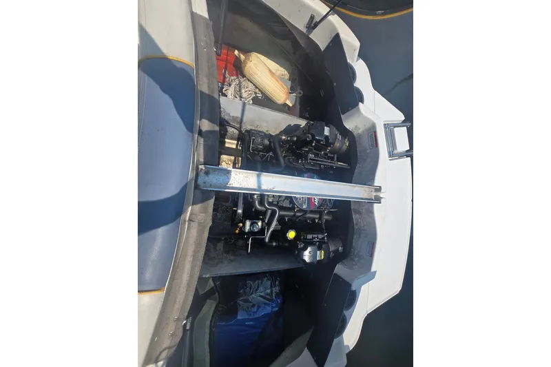 Slide: The Image of Engine compartment of a 2007 Sea Ray 185 Sport boat, showing mechanical components. - 10
