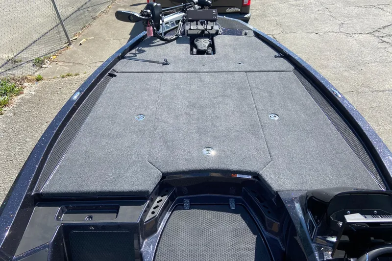 Slide: The Image of Front deck of 2026 iKon VLX 21 boat with carpeted surface and equipment. - 4