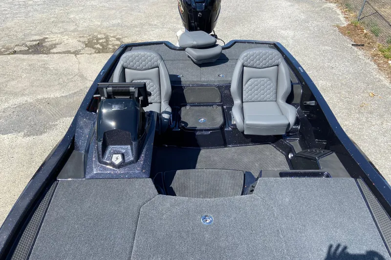 Slide: The Image of 2026 iKon VLX 21 boat interior with two gray seats and sleek design. - 3
