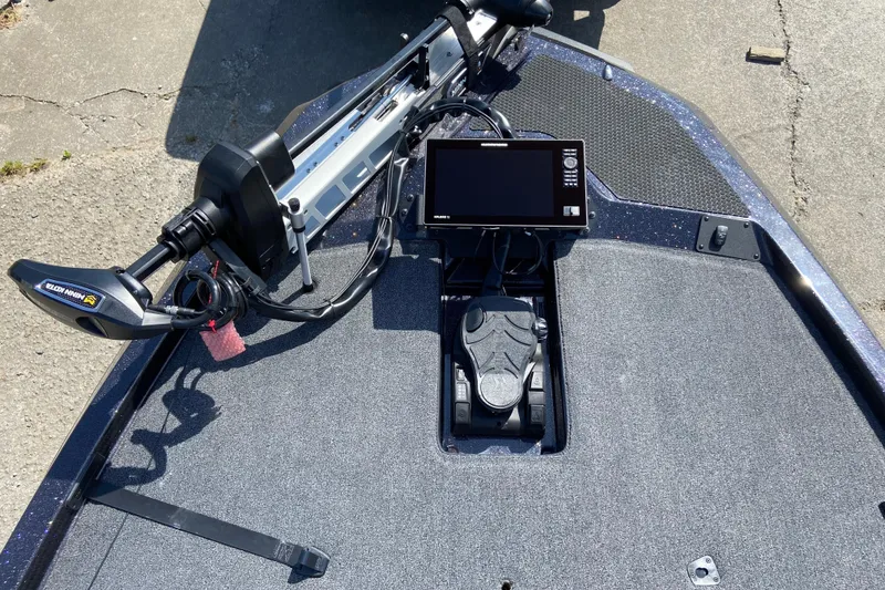 Slide: The Image of Fishing boat deck with advanced electronics and trolling motor, iKon VLX 21, 2026 model. - 6