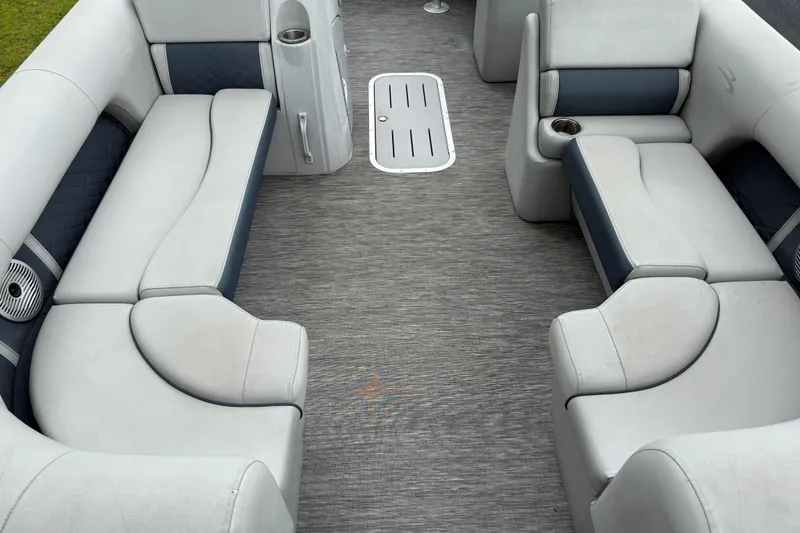 Slide: The Image of Interior of 2022 Bennington LX 22 Swingback pontoon boat with plush seating and modern design. - 13