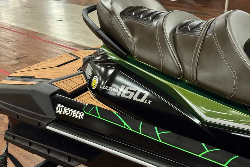 Slide: The Image of 2025 Kawasaki JET SKI ULTRA 160 LX with sleek design and comfortable seating. - 16