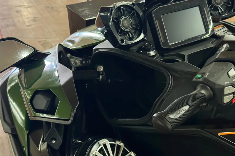 Slide: The Image of 2025 Kawasaki JET SKI ULTRA 160 LX dashboard with controls and display screen. - 13