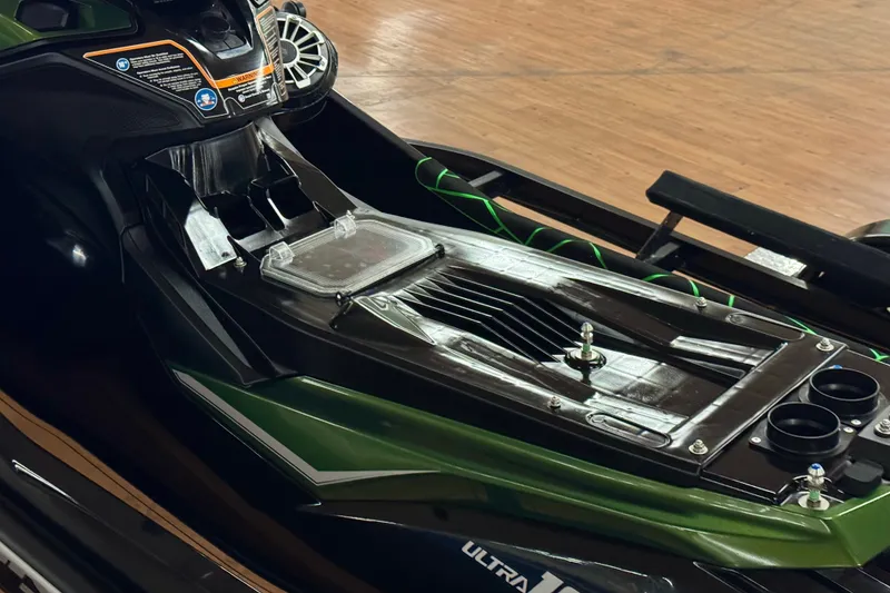 Slide: The Image of 2025 Kawasaki JET SKI ULTRA 160 LX, detailed view of seat and controls. - 18