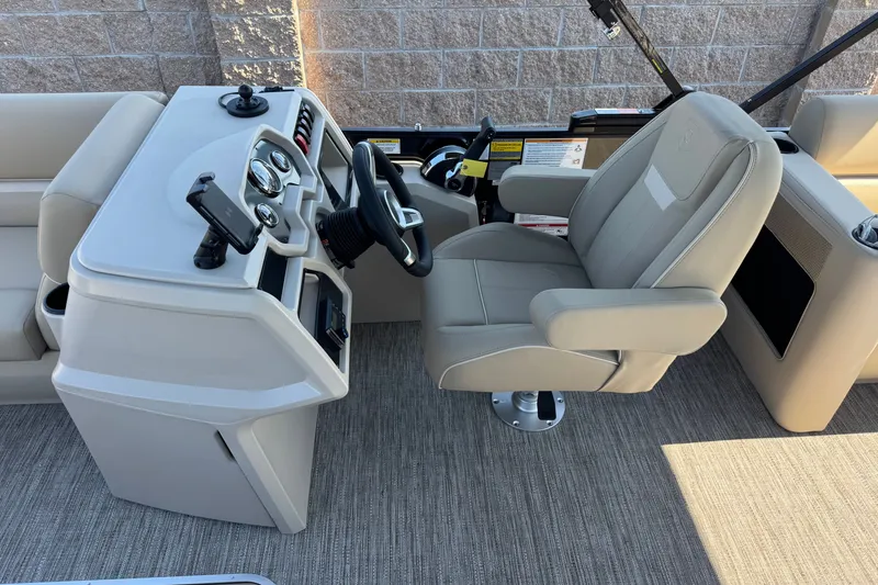 Slide: The Image of Captain's chair and helm of 2027 Godfrey EX 2286 SBX pontoon boat. - 6