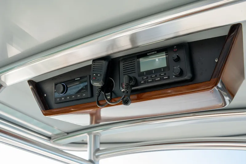Slide: The Image of Control panel of 2023 Harrison Boatworks 28 with Garmin and Fusion electronics. - 45