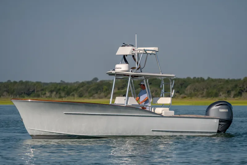 The Image of 2023 Harrison Boatworks 28 on water, featuring Yamaha engine and sleek design. - 0