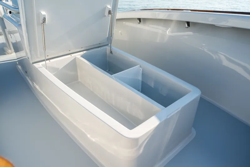 Slide: The Image of Open storage compartment on 2023 Harrison Boatworks 28, showcasing sleek design and functionality. - 47