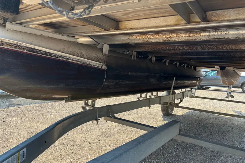 Slide: The Image of Underneath view of a 2008 Crestliner Batata Bay 2185 boat on a trailer. - 7