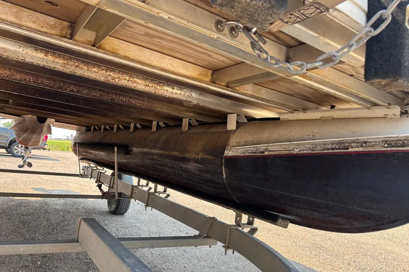 Slide: The Image of Underneath view of a 2008 Crestliner Batata Bay 2185 boat on a trailer. - 6
