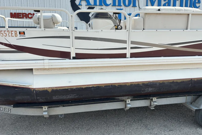 Slide: The Image of 2008 Crestliner Batata Bay 2185 pontoon boat on trailer, side view. - 2