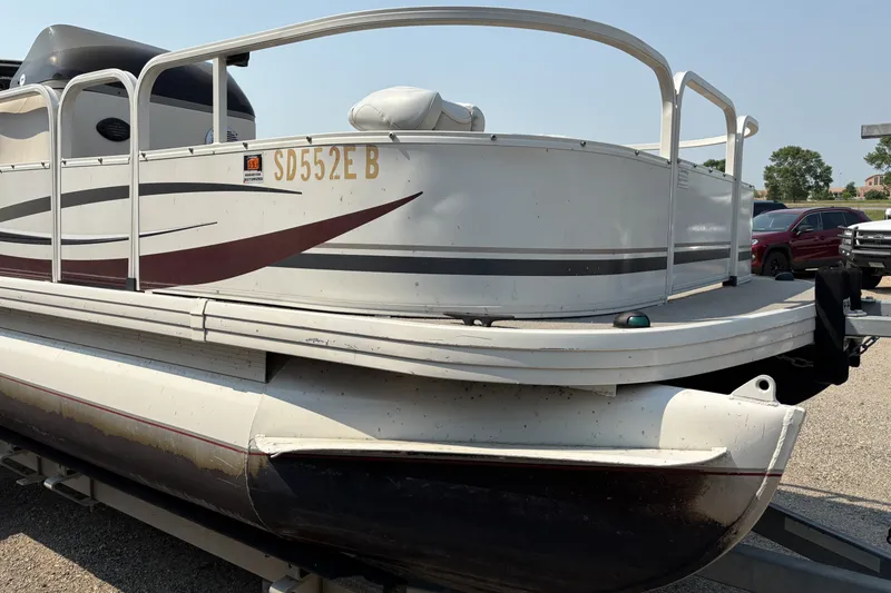 Slide: The Image of 2008 Crestliner Batata Bay 2185 pontoon boat on trailer, side view. - 5