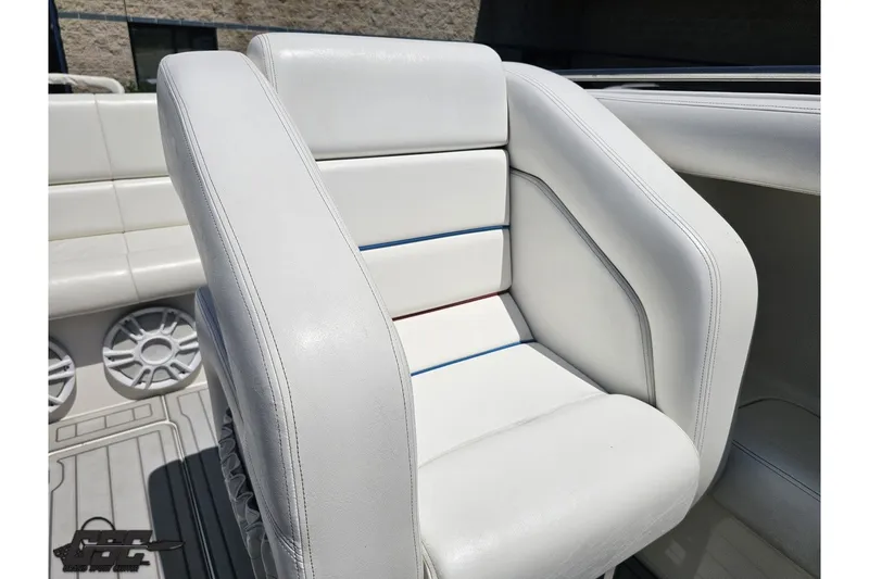 Slide: The Image of White leather seating on 2001 Advantage 34 Offshore boat, featuring modern design and comfort. - 77