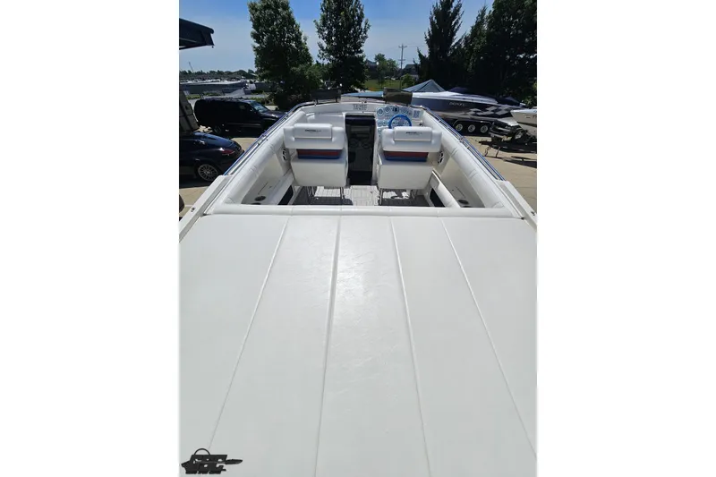 Slide: The Image of 2001 Advantage 34 Offshore boat interior with seating and dashboard view. - 37