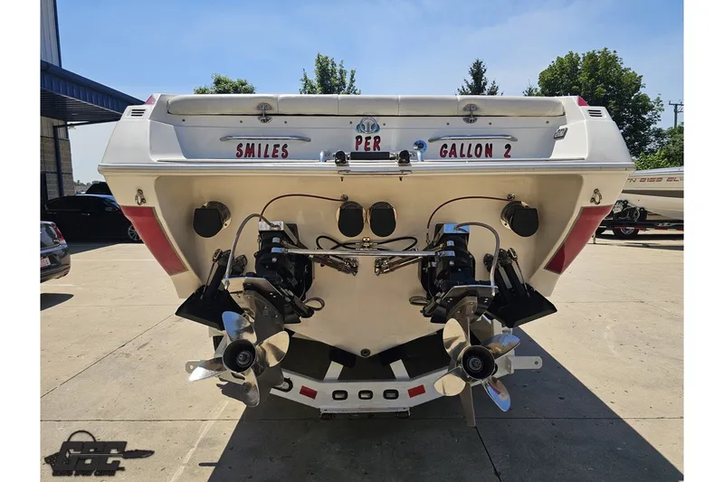 Slide: The Image of Rear view of a 2001 Advantage 34 Offshore boat with dual propellers. - 26