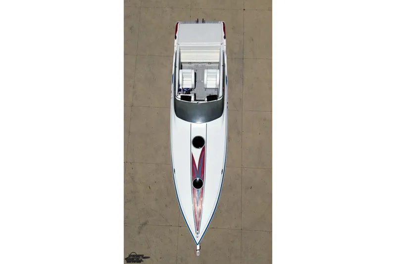 Slide: The Image of Top view of a 2001 Advantage 34 Offshore boat with sleek design and vibrant graphics. - 34