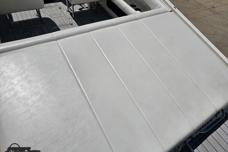 Slide: The Image of White seating area on a 2001 Advantage 34 Offshore boat deck. - 36
