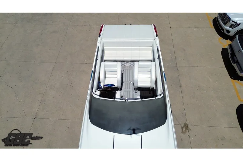 Slide: The Image of Aerial view of 2001 Advantage 34 Offshore boat with white seating and sleek design. - 32