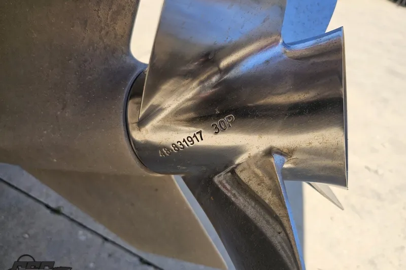 Slide: The Image of Close-up of a 2001 Advantage 34 Offshore boat propeller with engraved serial number. - 92