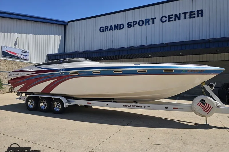 Slide: The Image of 2001 Advantage 34 Offshore boat on trailer at Grand Sport Center. - 13