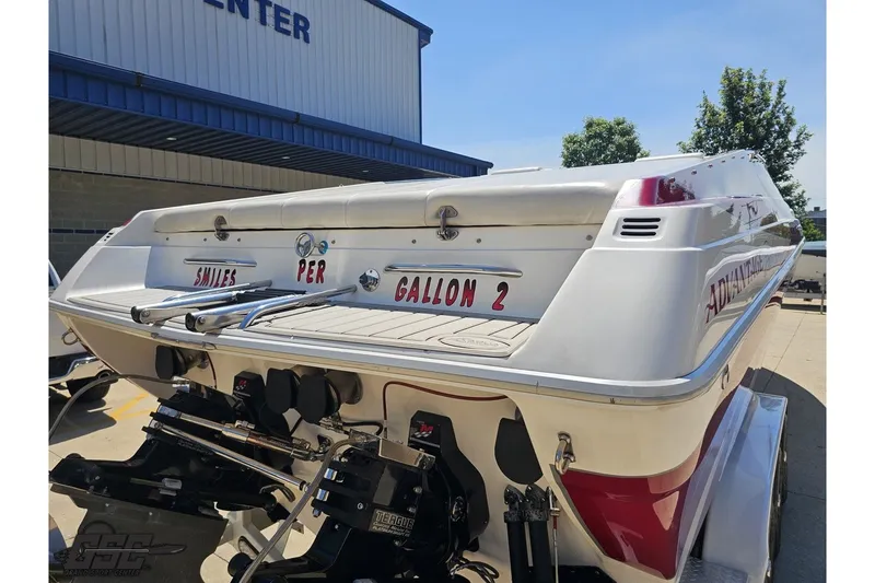 Slide: The Image of 2001 Advantage 34 Offshore boat with dual engines, parked outdoors. - 28