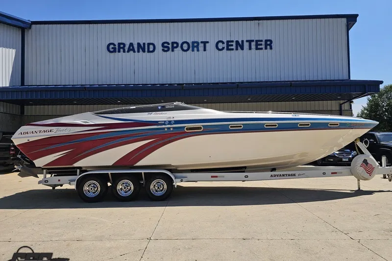 Slide: The Image of 2001 Advantage 34 Offshore boat on trailer at Grand Sport Center. - 3