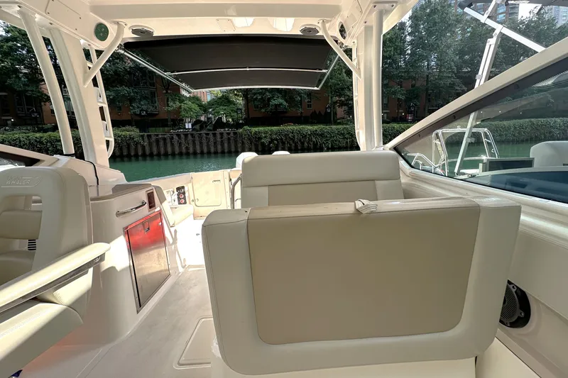 Slide: The Image of Interior view of 2025 Boston Whaler 280 Vantage boat, featuring luxurious seating and modern design. - 9