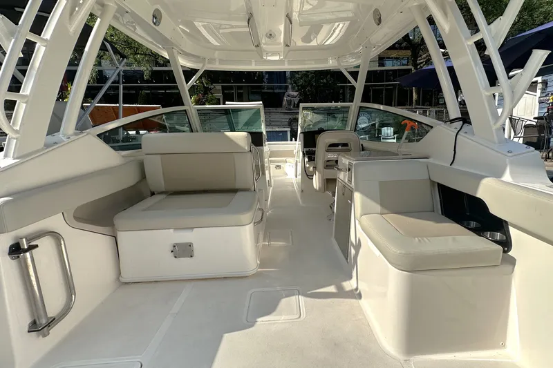 Slide: The Image of 2025 Boston Whaler 280 Vantage boat interior with spacious seating and modern design. - 8